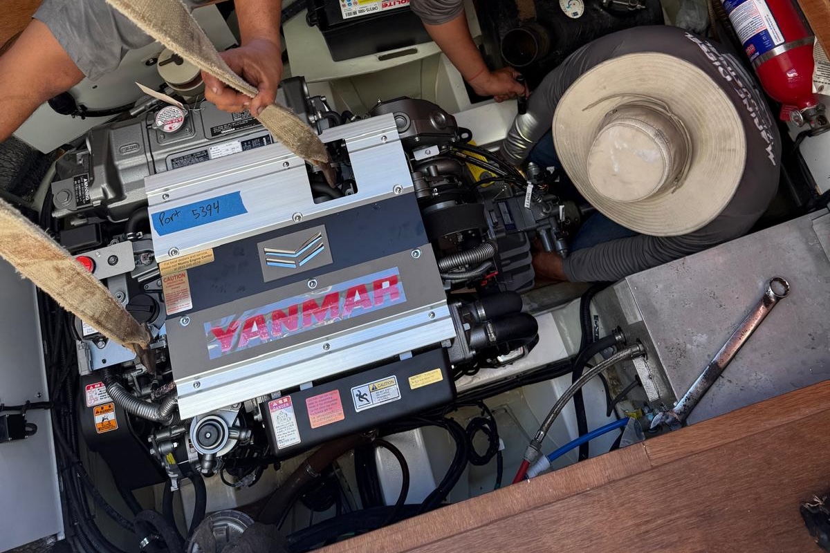 MDI technician working on a Yanmar marine diesel engine
